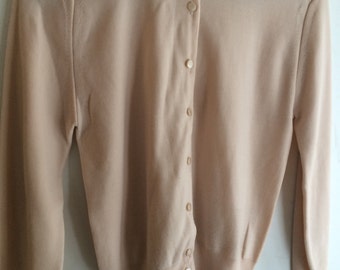 Beautiful ballet pink sweater.