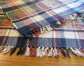 Set of 2 matching Rag rugs with fringes.Woven. Plaid pattern.Oblong