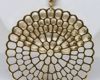 Stunning gold tone necklace with large pendant
