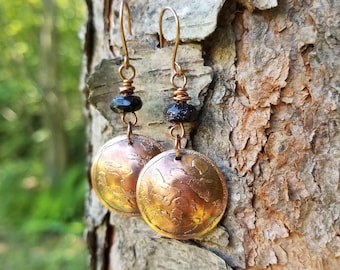 Handmade etched copper earrings.