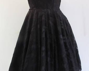 Short black lace dress with sweetheart neckline