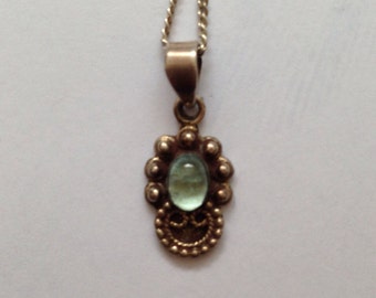 Dainty little vintage sterling silver pendant