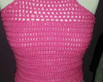Handmade crochet backless halter top in hot pink.