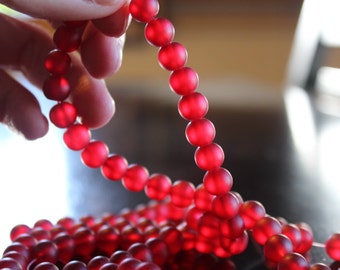 100 approx. 8 mm red frosted glass beads, round and smooth, one strand for making jewelry