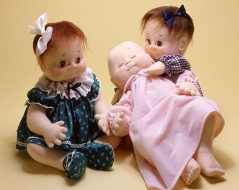 Baby Love, life size doll and her clothing shown, easy to sew doll pattern from Carolee Creations. SewSweet Dolls