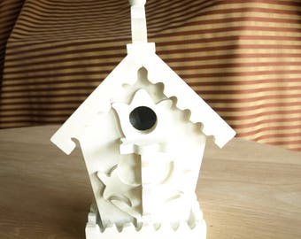 White Birdhouse with Decorative Floral Patterns, edging and finials