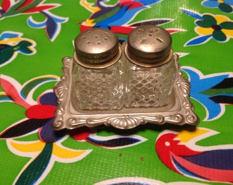Vintage glass small square salt and pepper shakers with metal lids and tray