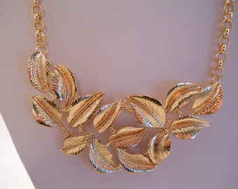 Gold Leaves Pendant Bib Necklace on a Gold Tone Chain