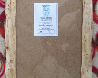 Rustic/driftwood style frame in locally sourced,recycled pine in clear beeswax finish.To fit A4,Free U.K. shipping