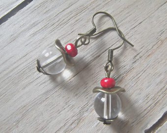 Earrings composed of two 8 mm diameter transparent round glass beads