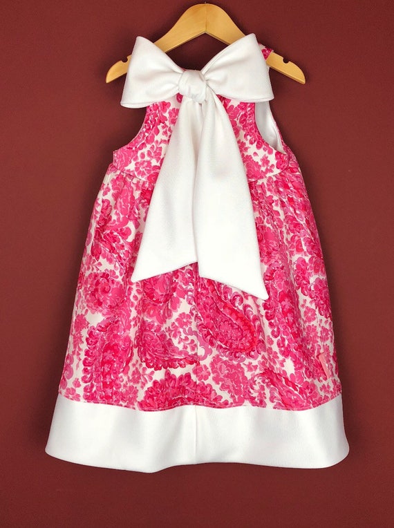 The "Bow-Backed Dress" in Pink Paisly.