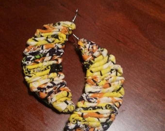 Leather "moonies" earrings with batik fabric.