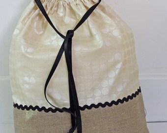 Golden beige laundry bag