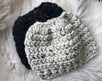 Sale- Womens or teen messy bun beanie, ponytail hat. Messy bun hat. Black tweed or cream tweed. Chunky soft yarn. Sloppy bun hat