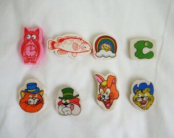 Six vintage novelty erasers