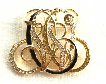Monogram brooch