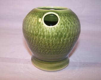 Toothbrush Pot. Height 10 cm. Width 11 cm. Glaze : Moss Green