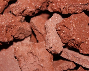 Earthy Goodies crunchy brick red clay dirt chunks. Clean, low grit and earthy clay pieces