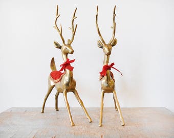 holiday brass deer, large brass deer figurines, vintage brass reindeer with red and gold velvet trim, Christmas decor, mid century