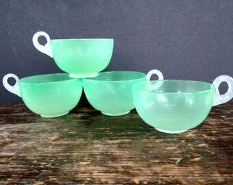 Four Early Jadeite Tea Cups
