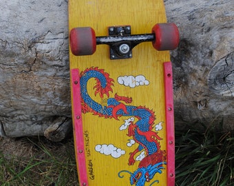 Classic woody skateboard with S.L. CO trucks and 57mm wheels