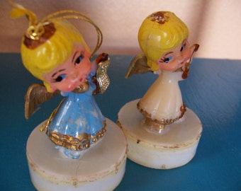 two tiny plastic angels