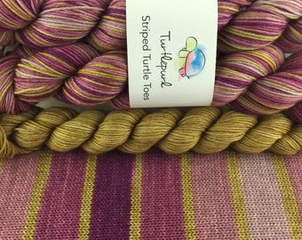City Girl With Gold Heel and Toe - Hand-Dyed Self-Striping Sock Yarn