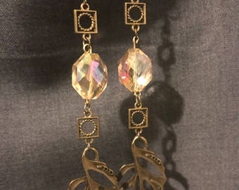 Simple iridescent bead and antique gold dangle.
