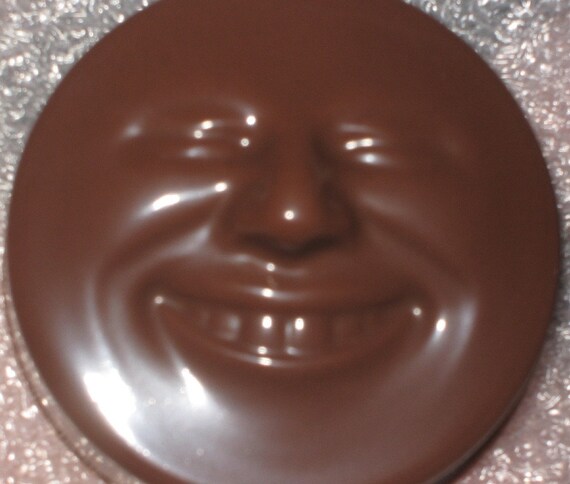 Smiling happy face chocolate covered sandwich cookie oreos party favors