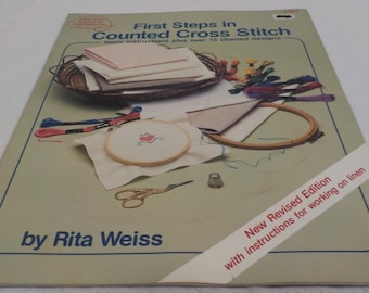 The First Steps in Cross Stitch Cross Stitch Patterns Basic Instructions with over 15 Charted Designs, By American School Of Needle Work