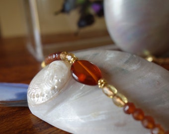 Amber gold and hessian garnet beaded necklace