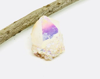 Spirit angel aura quartz. Length- 1.5 inch. Natural and genuine.