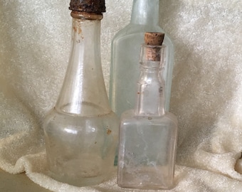 Antique Glass bottles reclaimed three