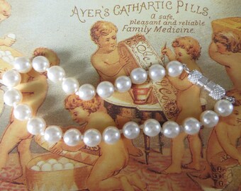 Handknotted pearl bracelet - tiny ivory freshwater pearl bracelet - white pearl bracelet - wedding jewelry bridesmaid gift