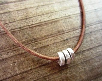 Sterling Silver and Leather Cord Necklace with Hammered Nugget Beads - mens/womens