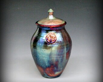 Raku Urn or Lidded Vase with Sun and Moon Motif in Metallic Iridescent Colors