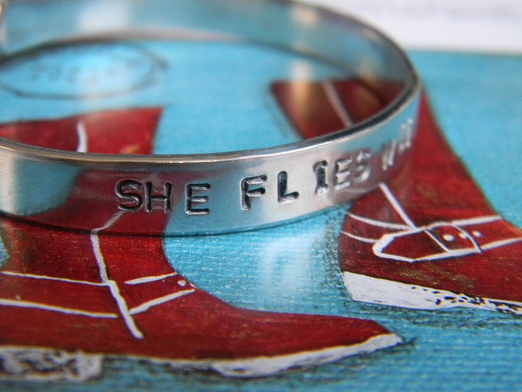 She Flies With Her Own Wings. She Flies With Her Own Wings.