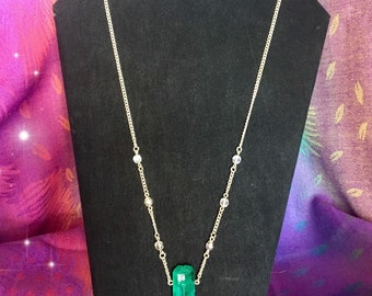 Crystal pendant necklace with beaded accents and long chain