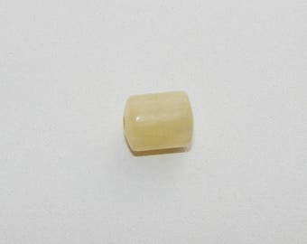 Yellow calcite cylinder 13 by 10 mm.