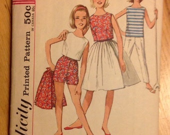 Vintage Girl's skirt, blouse, top and blouse in two lengths Simplicity 4967