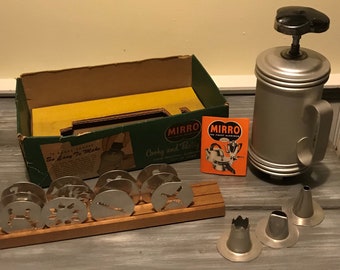 Vintage Mirro Cookie Press with wooden stand, and original box bottom