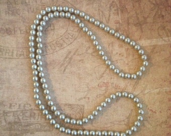 Long Strand Pearl Necklace