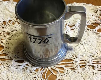 Vintage 1776 Tankard that says Duratale byLeonard Italy . . .