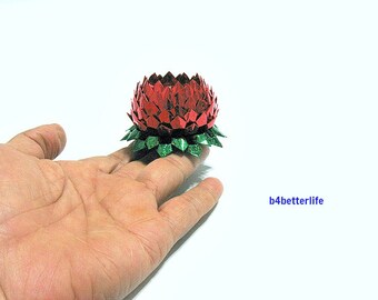 A piece of Small Size Red Color Hand-folded Origami Lotus. (4D Glittering paper series).