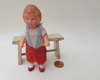 Old East German vintage baby doll to the doll's House