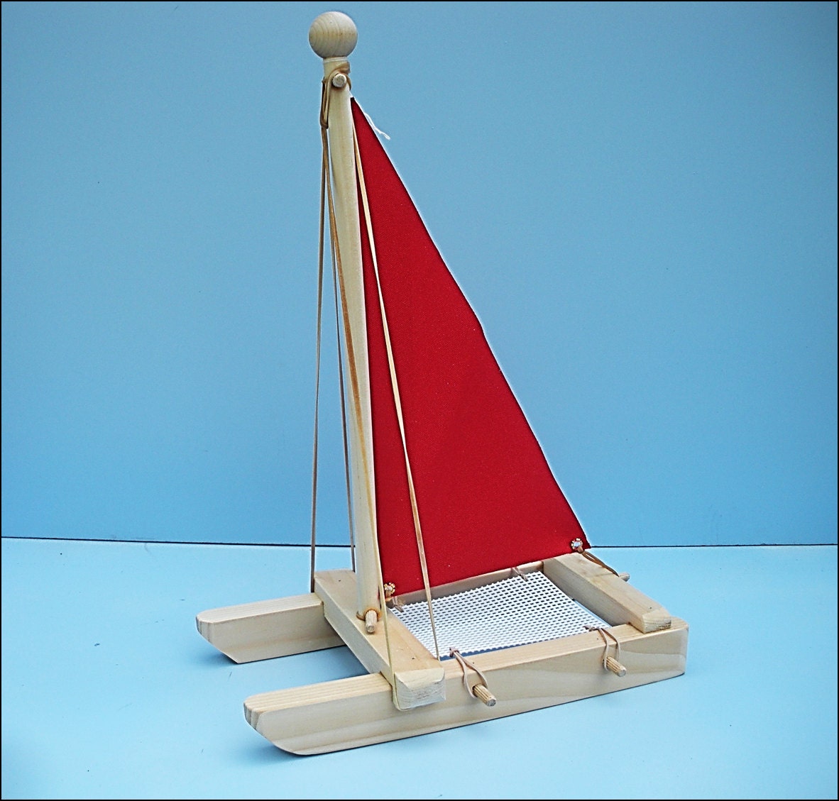 red sailboat toys