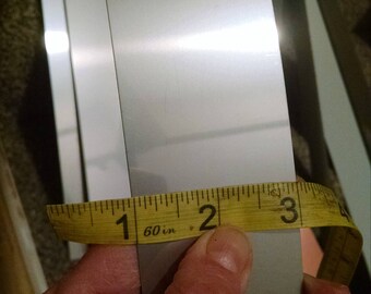 24 gauge - .020" thick. 2" wide strips. Mill finish Stainless steel