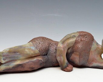 Abstract Reclining Buddha Figure at Rest in Raku Ceramics