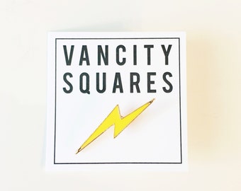 Lightning Bolt enamel lapel pin.