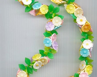 So pretty! Vintage celluloid flower necklace signed West Germany